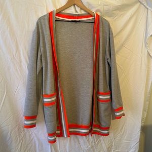Grey and orange open cardigan. Neon detail.